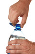 hand unscrew the cork on a bottle of water