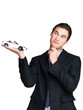 Young man thinking over possibilities for new car loan