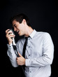 Young guy performing live at the concert