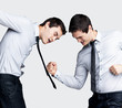 Psycho young business man fighting with himself