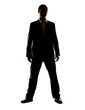 Confident young male executive standing on white