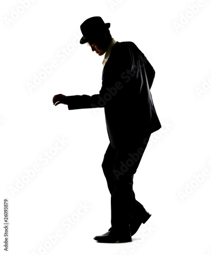 Photo: Young male dancer dancing on white Young male dancer dancing on white