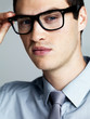 Handosme young male business executive in glasses
