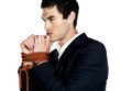Bankruptcy  - Thoughtful business man being tied up with rope