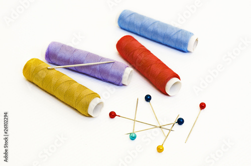 Foto: thread spools and needle thread spools and needle