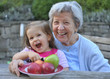 Grandma & Granddaughter with Apples 1 Grandma & Granddaughter with Apples 1