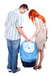 young couple with part of baby buggy