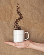 female hand holding a mug female hand holding a mug