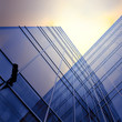 glass office building in the evening glow glass office building in the evening glow