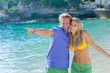 Photo: Couplet on the Beach, Man pointing fingers Couplet on the Beach, Man pointing fingers