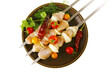 fresh raw chicken kebabs on plate