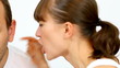 Screaming woman to man ear, isolated