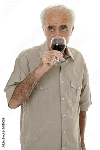 Photo: Senior man drinking a glass of red wine Senior man drinking a glass of red wine