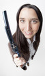 Cowgirl smiling with big revolver