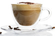 cappuccino mit schokopulver in einer glastasse von der seite