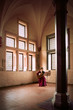 Woman playing guitar in Malbork Castle.