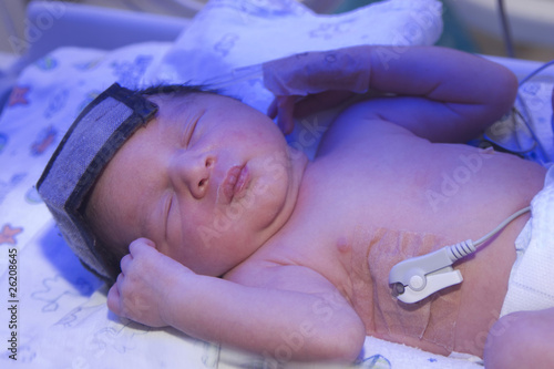 Photo: Newborn baby inside incubator Newborn baby inside incubator
