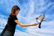 Girl feeds the dove