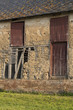 Façade en paillis d'une ferme traditionnelle