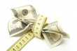 Dollar banknote and measure tape
