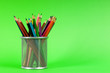 Many colorful pencils on the color background