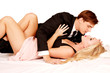 Loving couple on bed