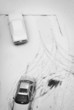 Elevated view of snow covered cars in parking lot