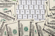 Keyboard with stack of money