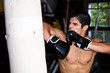 Fighter training in garage.