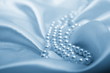 Photo: Pearls a necklace on a silk fabric Pearls a necklace on a silk fabric