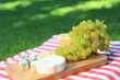 Cheese with white grapes