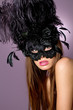 Beautiful young woman wearing mask