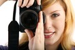 woman with single-lens reflex camera