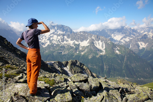 Photo: Girl looking to far mountains Girl looking to far mountains