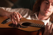 Young Musician Plays His Acoustic Guitar Young Musician Plays His Acoustic Guitar