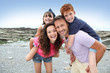 Parents doing piggyback to their children