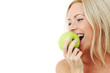 woman eat green apple