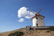 White windmill against blue sky