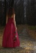 Female walking in the autumn forest