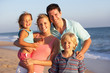 Portrait Of Family On Beach Holiday