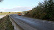 school bus climbing hill and going around a corner school bus climbing hill and going around a corner