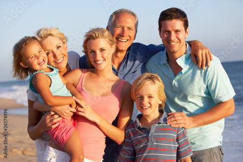 Photo: Portrait Of Three Generation Family On Beach Holiday Portrait Of Three Generation Family On Beach Holiday