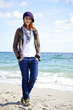 Fashion young women at the beach in sunny day. Fashion young women at the beach in sunny day.