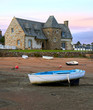 Ancient house and boats on a mooring - beautiful scenery