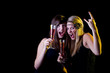 Young fresh teenage girls partying with drinks.