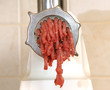 Meat grinder in action. Raw beef