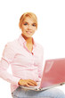 blonde with pink laptop