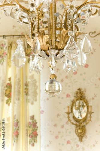Photo: chandelier and sconce on the wall chandelier and sconce on the wall