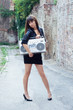 Woman with boom box on the street
