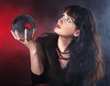 Young woman with crystal ball.